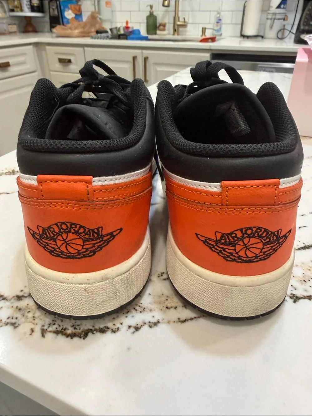 Nike youth Air Jordan’s in Black/Orange/White